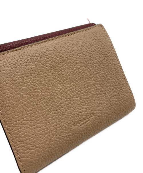 COACH（コーチ）COACH (コーチ) COACH　3つ折り財布 ベージュ×ピンクの古着・服飾アイテム