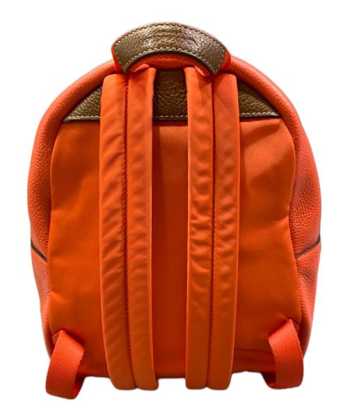 COACH（コーチ）COACH (コーチ) Keith Haring (キースヘリング) リュック オレンジの古着・服飾アイテム