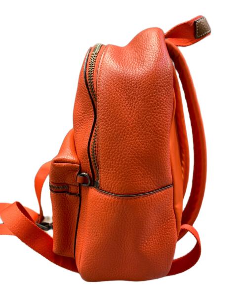 COACH（コーチ）COACH (コーチ) Keith Haring (キースヘリング) リュック オレンジの古着・服飾アイテム