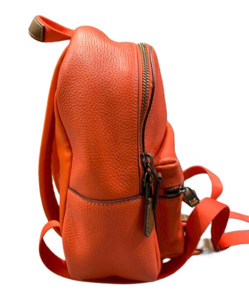 COACH（コーチ）COACH (コーチ) Keith Haring (キースヘリング) リュック オレンジの古着・服飾アイテム