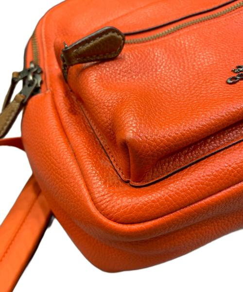 COACH（コーチ）COACH (コーチ) Keith Haring (キースヘリング) リュック オレンジの古着・服飾アイテム