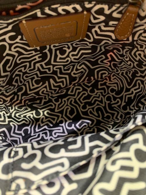 COACH（コーチ）COACH (コーチ) Keith Haring (キースヘリング) リュック オレンジの古着・服飾アイテム