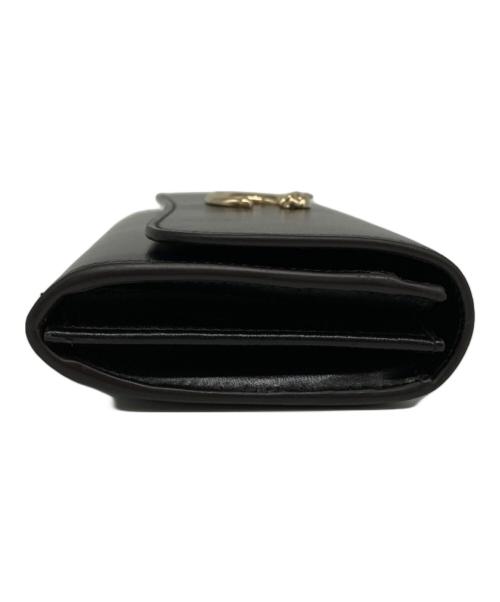 Cartier（カルティエ）Cartier (カルティエ) フラップ付インターナショナル ウォレット ブラックの古着・服飾アイテム