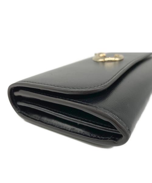 Cartier（カルティエ）Cartier (カルティエ) フラップ付インターナショナル ウォレット ブラックの古着・服飾アイテム