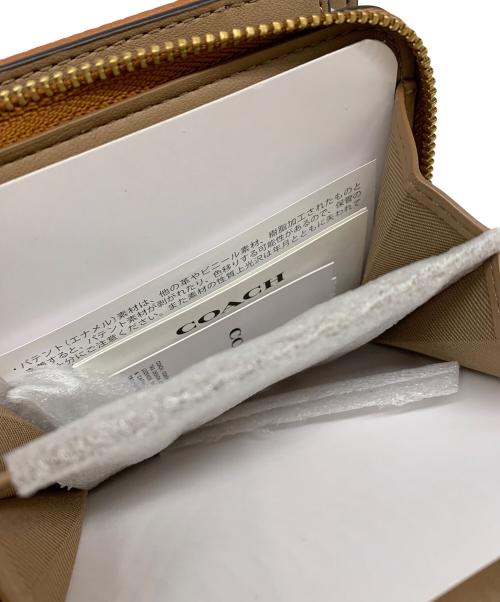 COACH（コーチ）COACH (コーチ) COACH　2つ折り財布 ブラウンの古着・服飾アイテム