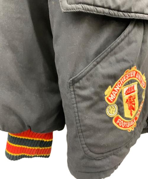 UMBRO（アンブロ）UMBRO (アンブロ) UMBRO　古着 マンチェスターユナイテッド　ブルゾン ブラック×レッド サイズ:Mの古着・服飾アイテム