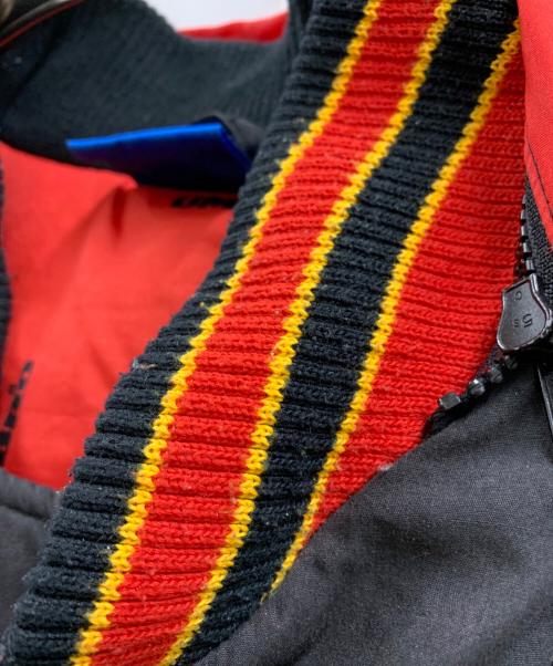 UMBRO（アンブロ）UMBRO (アンブロ) UMBRO　古着 マンチェスターユナイテッド　ブルゾン ブラック×レッド サイズ:Mの古着・服飾アイテム