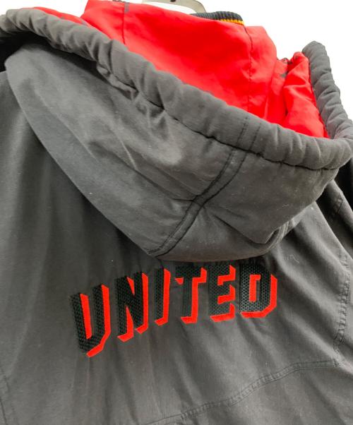 UMBRO（アンブロ）UMBRO (アンブロ) UMBRO　古着 マンチェスターユナイテッド　ブルゾン ブラック×レッド サイズ:Mの古着・服飾アイテム