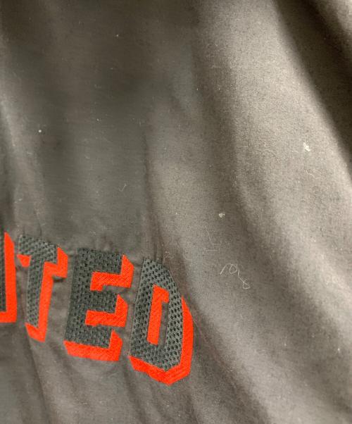 UMBRO（アンブロ）UMBRO (アンブロ) UMBRO　古着 マンチェスターユナイテッド　ブルゾン ブラック×レッド サイズ:Mの古着・服飾アイテム