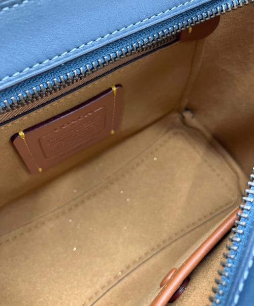 COACH（コーチ）COACH (コーチ) COACH　クーリエ キャリーオール　　2WAYバッグ ベージュ×ブルーの古着・服飾アイテム