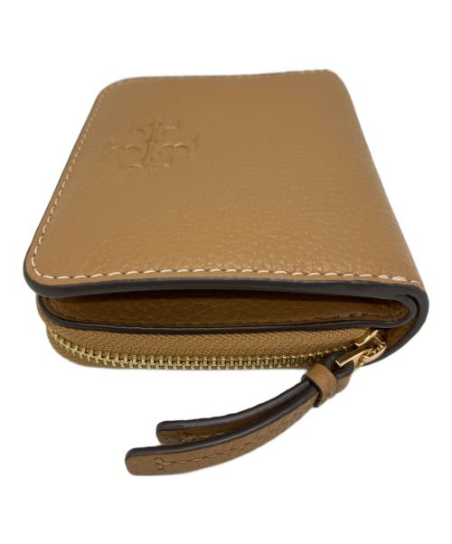 TORY BURCH（トリーバーチ）TORY BURCH (トリーバーチ) TORY BURCH　2つ折り財布 ベージュの古着・服飾アイテム