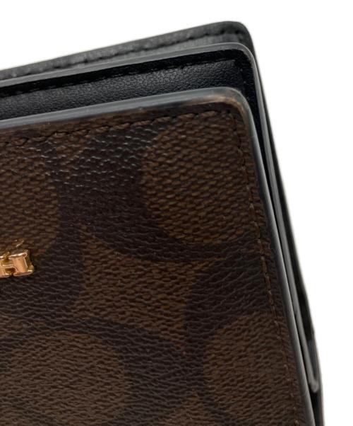 COACH（コーチ）COACH (コーチ) 2つ折り財布 ブラウン×ブラックの古着・服飾アイテム