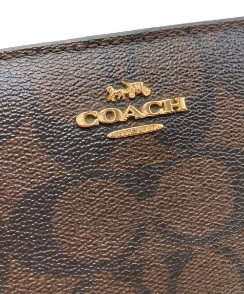 COACH（コーチ）COACH (コーチ) 2つ折り財布 ブラウン×ブラックの古着・服飾アイテム
