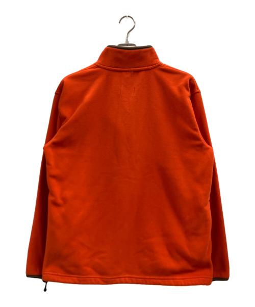 Champion（チャンピオン）Champion (チャンピオン) UNDEFEATED (アンディフィーテッド) POLARTEC SNAP JACKET オレンジ サイズ:Mの古着・服飾アイテム