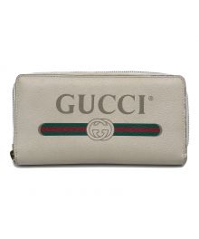 GUCCI（グッチ）の古着「ラウンドファスナーウォレット」｜アイボリー