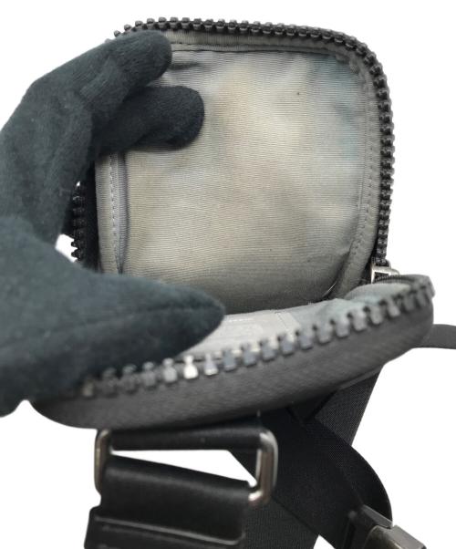 COACH（コーチ）COACH (コーチ) マルチファンクション フォーン パック ブロックド シグネチャー キャンバスの古着・服飾アイテム