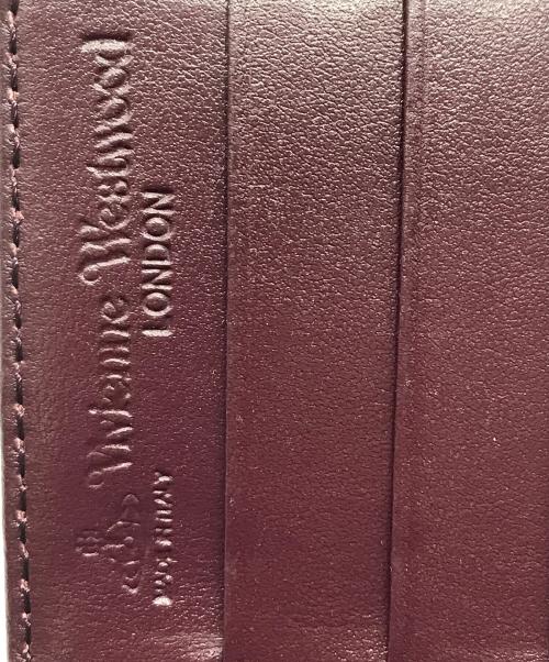 Vivienne Westwood（ヴィヴィアンウエストウッド）Vivienne Westwood (ヴィヴィアンウエストウッド) 長財布 グリーン×ワインレッドの古着・服飾アイテム