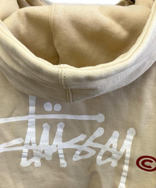 stussy（ステューシー）stussy (ステューシー) プルオーバーパーカー ベージュ サイズ:XLの古着・服飾アイテム