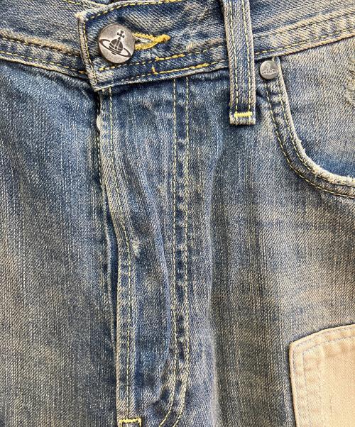 Vivienne Westwood（ヴィヴィアンウエストウッド）Vivienne Westwood (ヴィヴィアンウエストウッド) LEE (リー) パッチワークデニムパンツ インディゴ サイズ:W30 L34の古着・服飾アイテム