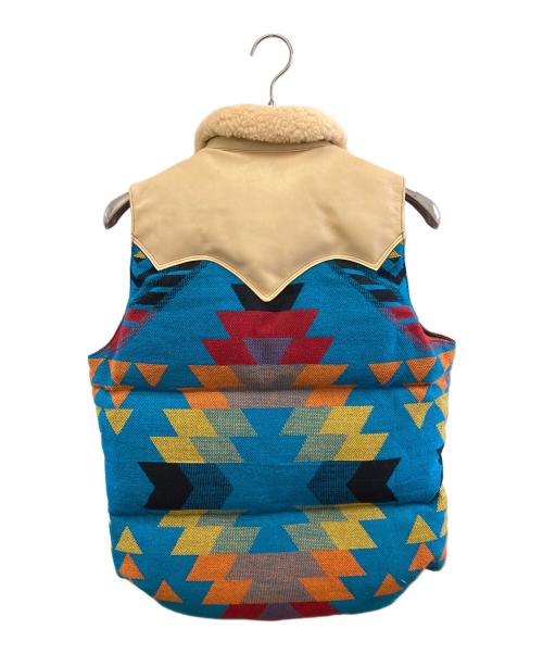 RockyMountainFeatherBed（ロッキーマウンテンフェザーベッド）RockyMountainFeatherBed (ロッキーマウンテンフェザーベッド) ベスト ブルー×マルチカラー サイズ:36の古着・服飾アイテム