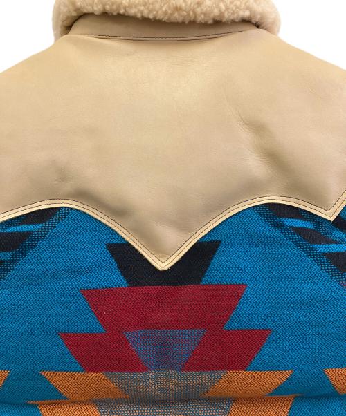 RockyMountainFeatherBed（ロッキーマウンテンフェザーベッド）RockyMountainFeatherBed (ロッキーマウンテンフェザーベッド) ベスト ブルー×マルチカラー サイズ:36の古着・服飾アイテム