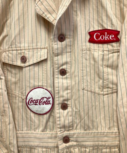 Coca Cola（コカコーラ）Coca Cola (コカコーラ) つなぎ ベージュ サイズ:Lの古着・服飾アイテム