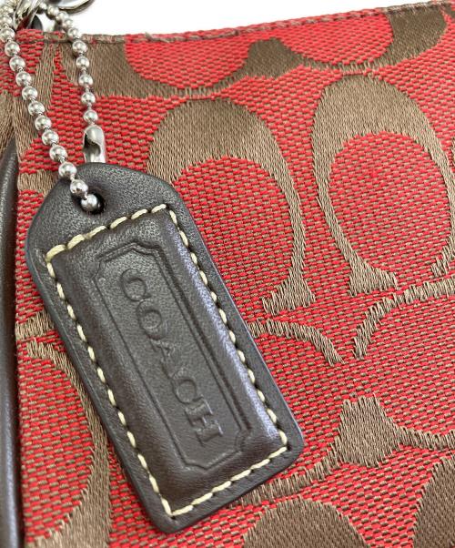COACH（コーチ）COACH (コーチ) ハンドポーチ レッド×ブラウンの古着・服飾アイテム