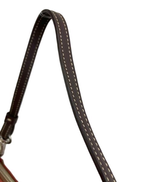 COACH（コーチ）COACH (コーチ) ハンドポーチ レッド×ブラウンの古着・服飾アイテム