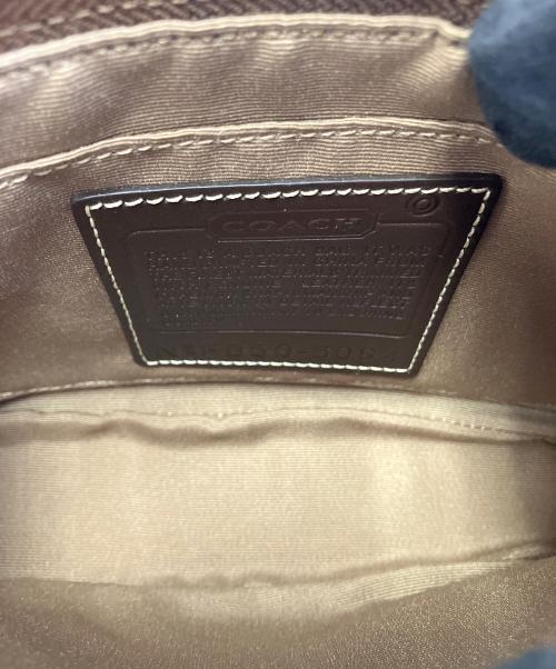 COACH（コーチ）COACH (コーチ) ハンドポーチ レッド×ブラウンの古着・服飾アイテム