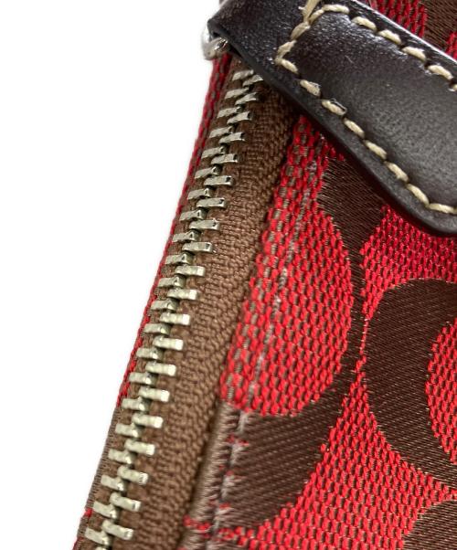 COACH（コーチ）COACH (コーチ) ハンドポーチ レッド×ブラウンの古着・服飾アイテム