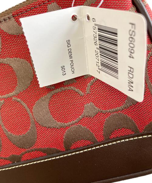 COACH（コーチ）COACH (コーチ) ハンドポーチ レッド×ブラウンの古着・服飾アイテム