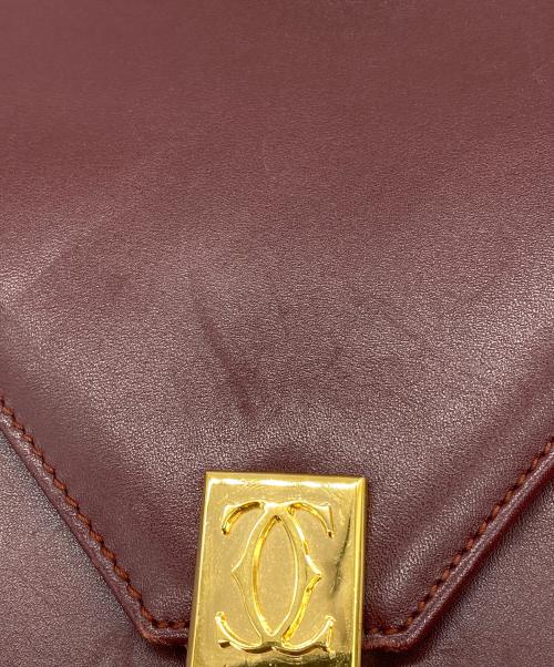 must de cartier（マストドゥカルティエ）must de cartier (マストドゥカルティエ) レザーフラップショルダーバッグ ワインレッドの古着・服飾アイテム
