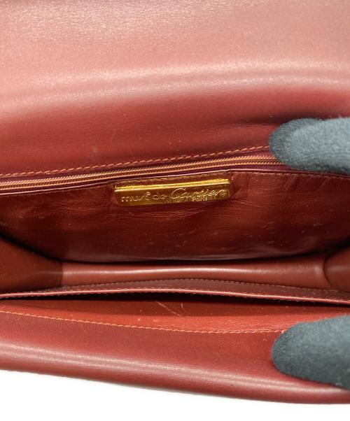 must de cartier（マストドゥカルティエ）must de cartier (マストドゥカルティエ) レザーフラップショルダーバッグ ワインレッドの古着・服飾アイテム
