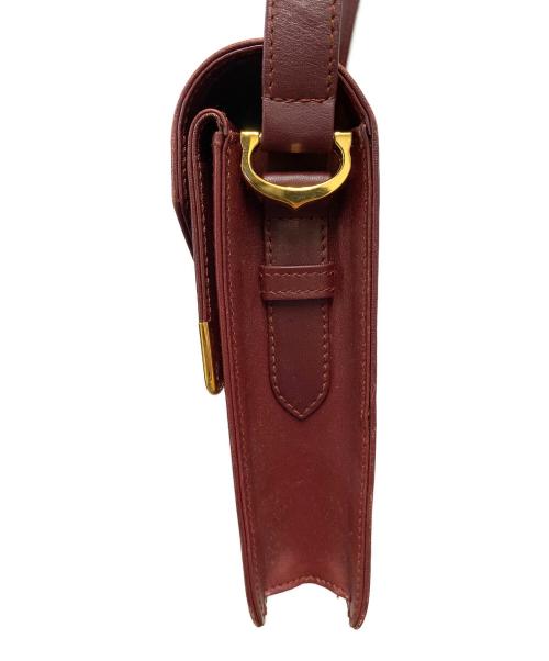 must de cartier（マストドゥカルティエ）must de cartier (マストドゥカルティエ) レザーフラップショルダーバッグ ワインレッドの古着・服飾アイテム
