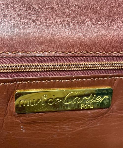must de cartier（マストドゥカルティエ）must de cartier (マストドゥカルティエ) レザーフラップショルダーバッグ ワインレッドの古着・服飾アイテム