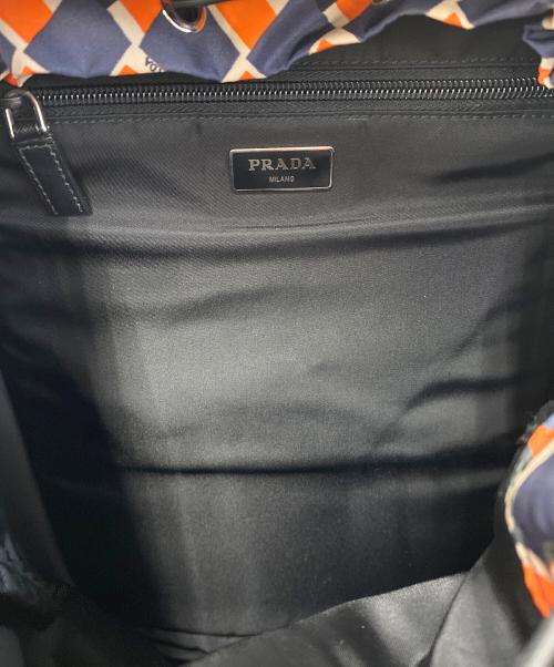 PRADA（プラダ）PRADA (プラダ) ナイロンリュック オレンジ×ネイビーの古着・服飾アイテム