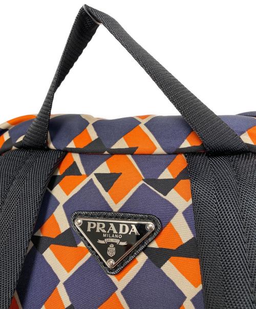 PRADA（プラダ）PRADA (プラダ) ナイロンリュック オレンジ×ネイビーの古着・服飾アイテム