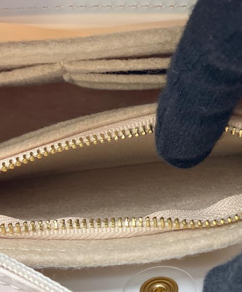 LONGCHAMP（ロンシャン）LONGCHAMP (ロンシャン) ハンドル付きポーチ ベージュ×ブラウンの古着・服飾アイテム