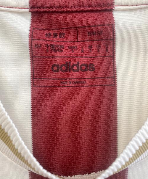 adidas（アディダス）adidas (アディダス) トレーニングウェア レッド×ベージュ サイズ:J M 未使用品の古着・服飾アイテム
