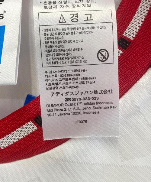 adidas（アディダス）adidas (アディダス) トレーニングウェア ホワイト×レッド サイズ:J M 未使用品の古着・服飾アイテム