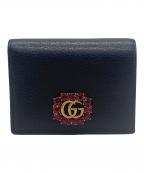 GUCCIグッチ）の古着「ラインクリスタルコンパクトウォレット」｜ブラック