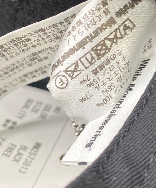 WHITE MOUNTAINEERING（ホワイトマウンテ二アニング）WHITE MOUNTAINEERING (ホワイトマウンテ二アニング) UMBRO (アンブロ) 帽子 ブラック 未使用品の古着・服飾アイテム