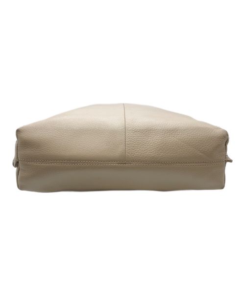 ear PAPILLONNER（イアパピヨネ）ear PAPILLONNER (イアパピヨネ) バックル巾着ショルダーバッグ ベージュの古着・服飾アイテム