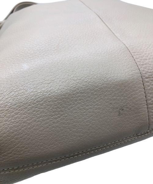 ear PAPILLONNER（イアパピヨネ）ear PAPILLONNER (イアパピヨネ) バックル巾着ショルダーバッグ ベージュの古着・服飾アイテム