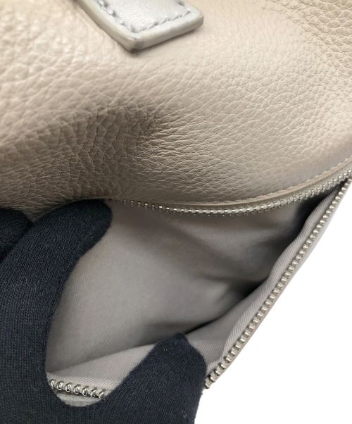 ear PAPILLONNER（イアパピヨネ）ear PAPILLONNER (イアパピヨネ) バックル巾着ショルダーバッグ ベージュの古着・服飾アイテム