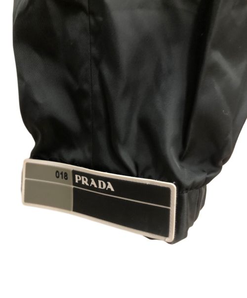 PRADA（プラダ）PRADA (プラダ) ラバーパッチナイロントラックロングパンツ ブラック サイズ:46の古着・服飾アイテム