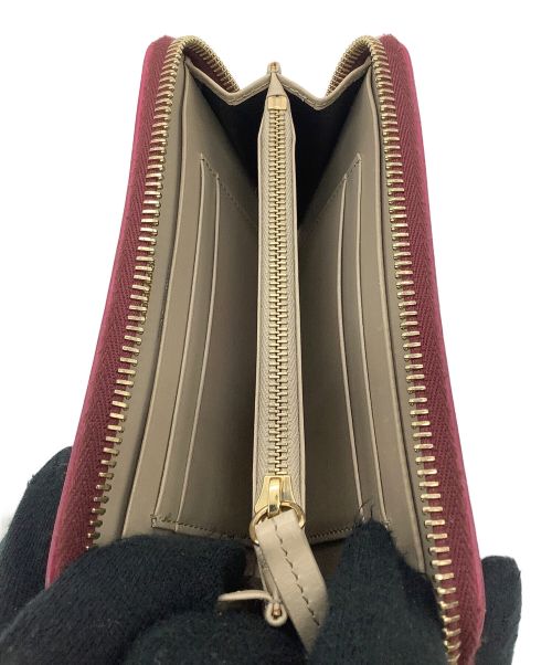 JIL SANDER（ジルサンダー）JIL SANDER (ジルサンダー) ラウンドファスナー2つ折り財布 バーガンディーの古着・服飾アイテム