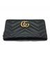 GUCCI（グッチ）の古着「ダブルG ジップアラウンドウォレット」｜ブラック×ゴールド
