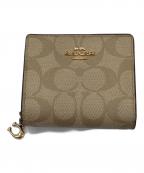 COACHコーチ）の古着「スナップ ウォレット シグネチャー キャンバス」｜ベージュ