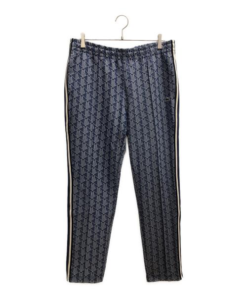 LACOSTE（ラコステ）LACOSTE (ラコステ) サイドテーピングモノグラムジャカードトラックパンツ ブルー×ホワイト サイズ:SIZE L(US)の古着・服飾アイテム